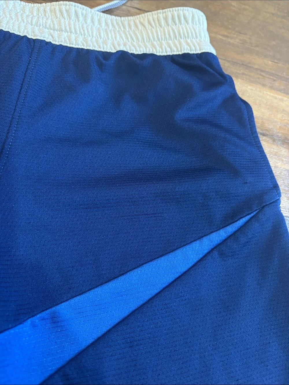Nike Royal Blue Kids Athletic Shorts with Light Blue Swoosh and White Waistband